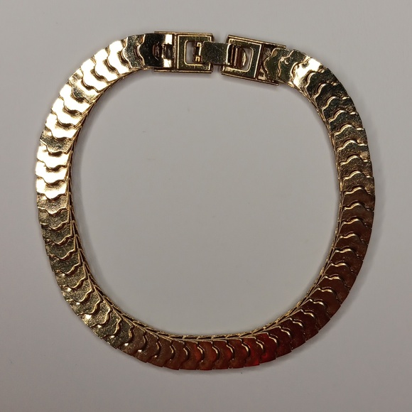 Jewelry - Gold tone link bracelet with horsebit clasps